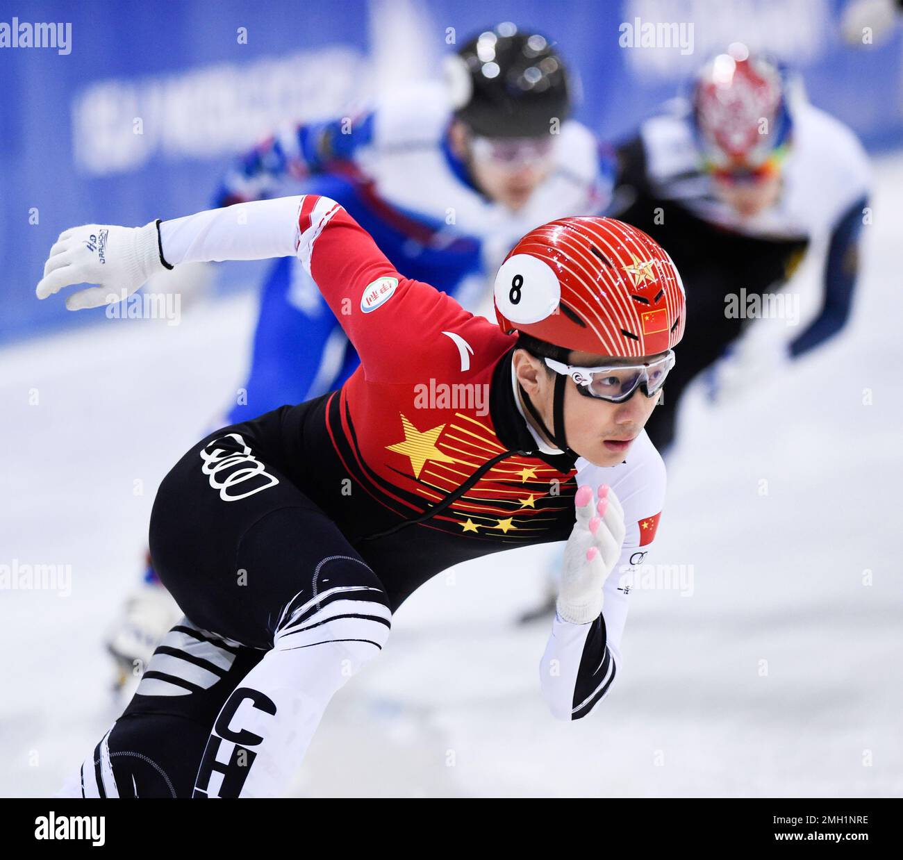 China's Ren Ziwei breaks away form his rivals to win the me's 1500