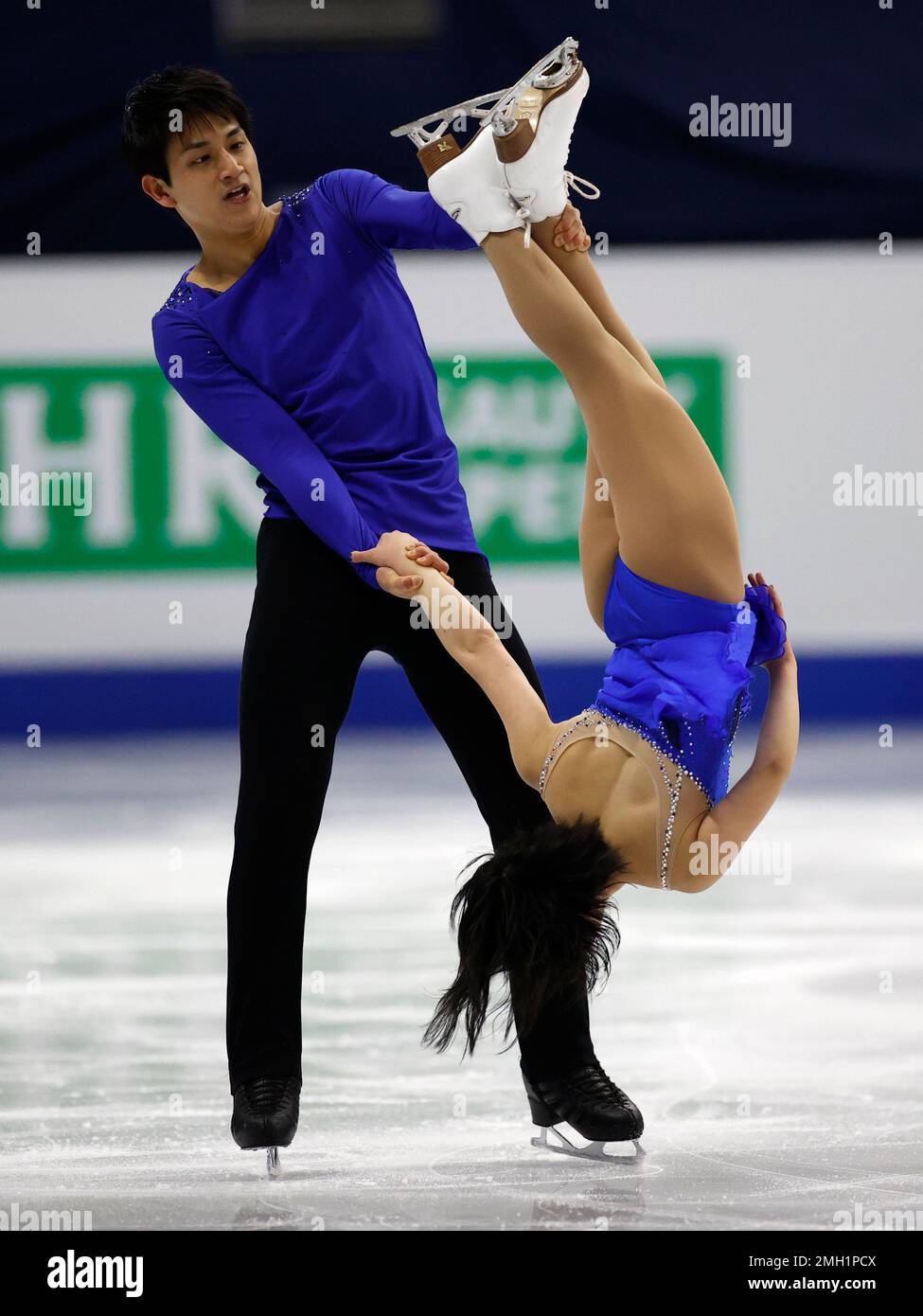 Japan's Riku Miura and Ryuichi Kihara perform during the pairs free