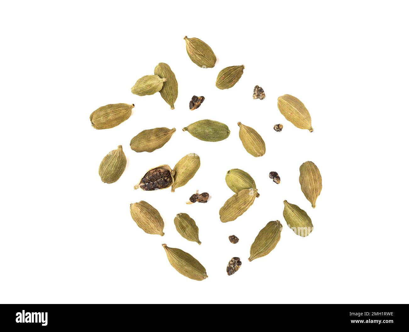 Top view of green cardamom pods and seeds on white background. Cardamom