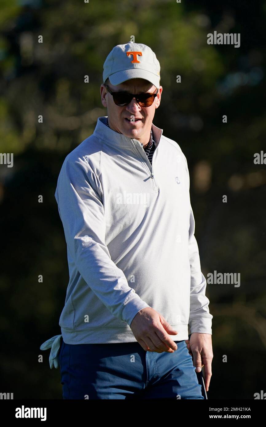 Peyton Manning looks over the first green of the Spyglass Hill Golf