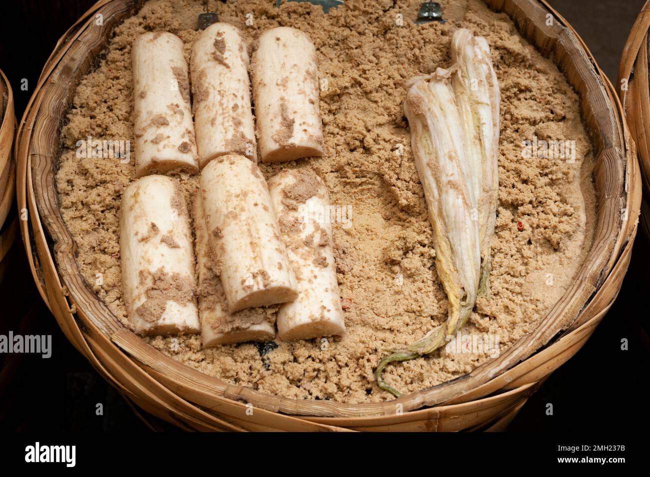 Fermented nukazuke pickles in rice bran for sale at the Nishiki Market