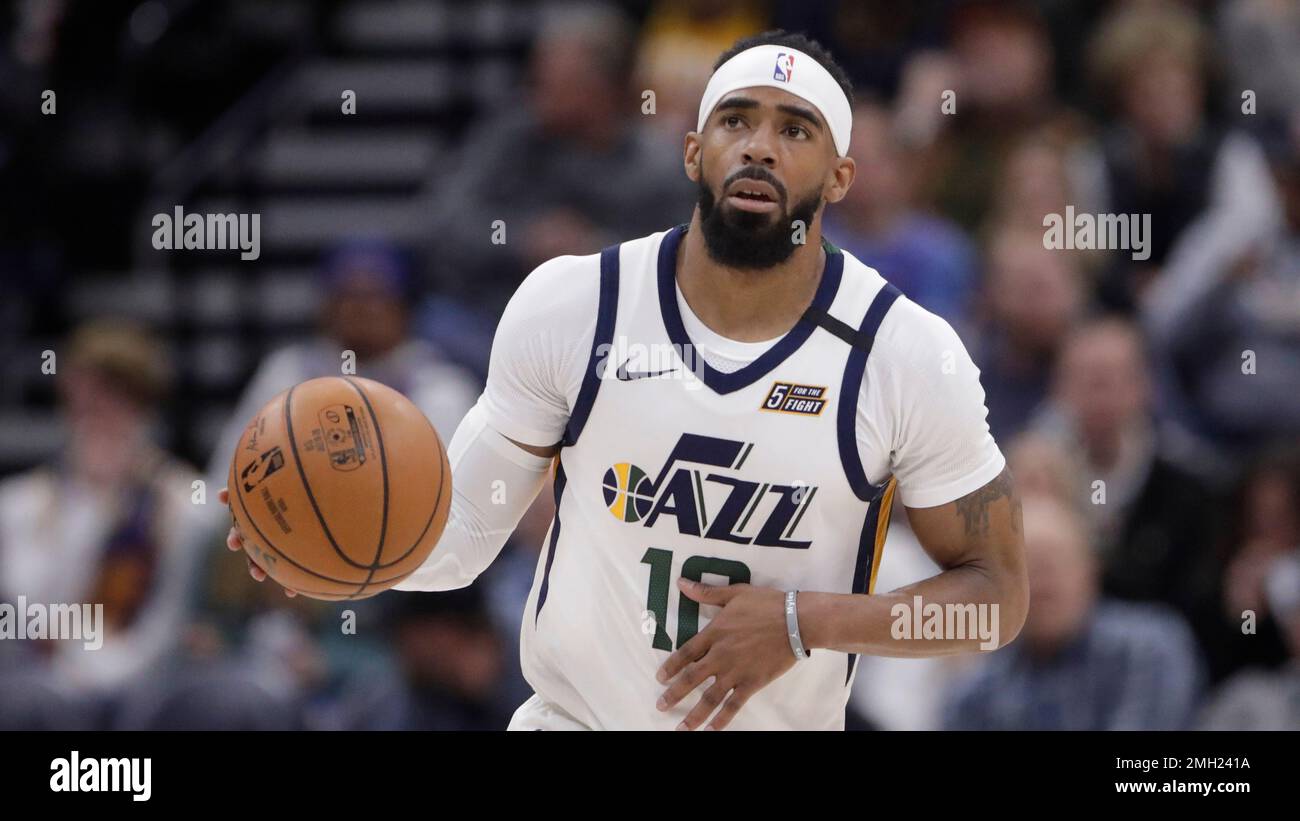 Utah Jazz guard Mike Conley (10) brings the ball up court in the second half during an NBA basketball game against the Denver Nuggets Wednesday, Feb. 5, 2020, in Salt Lake City. (AP Photo/Rick Bowmer) Stock Photo