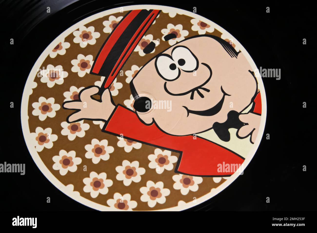 Viersen, Germany - January 9. 2023: Closeup of vinyl record cover of signor mr rossy cartoon character tv music of italian animator Bruno Bozzetto Stock Photo
