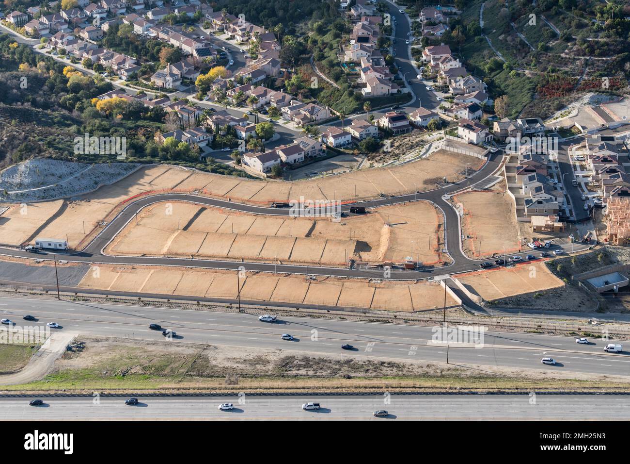 Aerial of view of graded dirt lots ready for new tract home construction in Los Angeles County California. Stock Photo