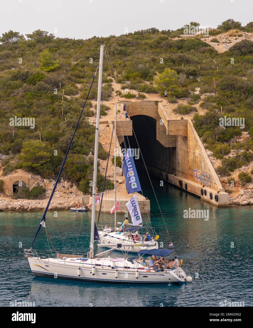 Parja ISLAND OF VIS, CROATIA, EUROPE - Tourists on sailboats visit submarine ...