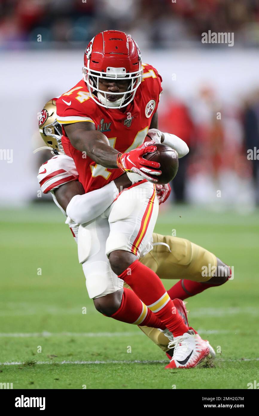 Kansas City Chiefs wide receiver Sammy Watkins (14) tries to break free ...