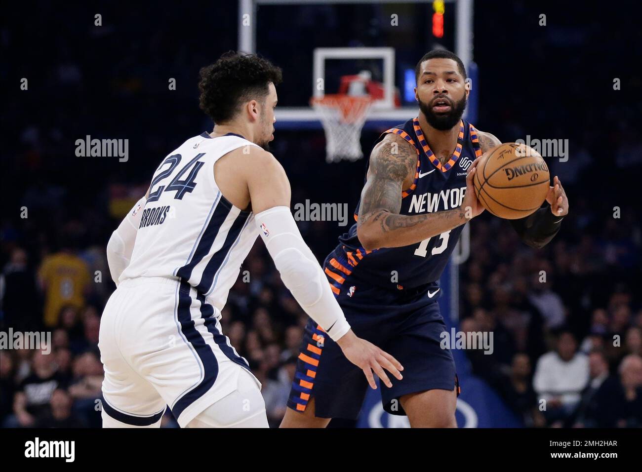 New York Knicks' Marcus Morris Sr. (13) passes away from Memphis