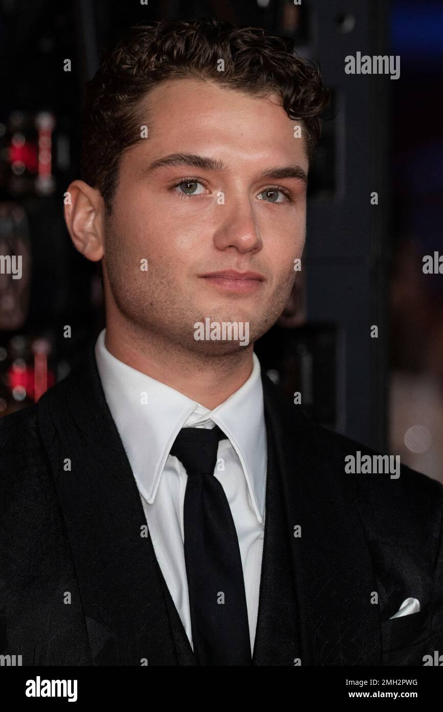 Rafferty Law poses for photographers upon arrival at the Bafta Film Awards, in central London