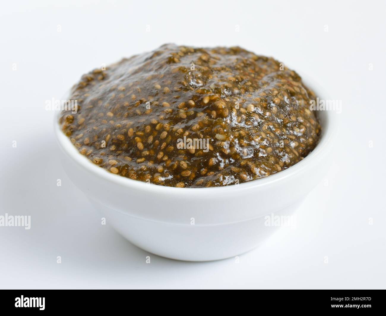 Chia seeds caviar with laminaria on white background Stock Photo Alamy