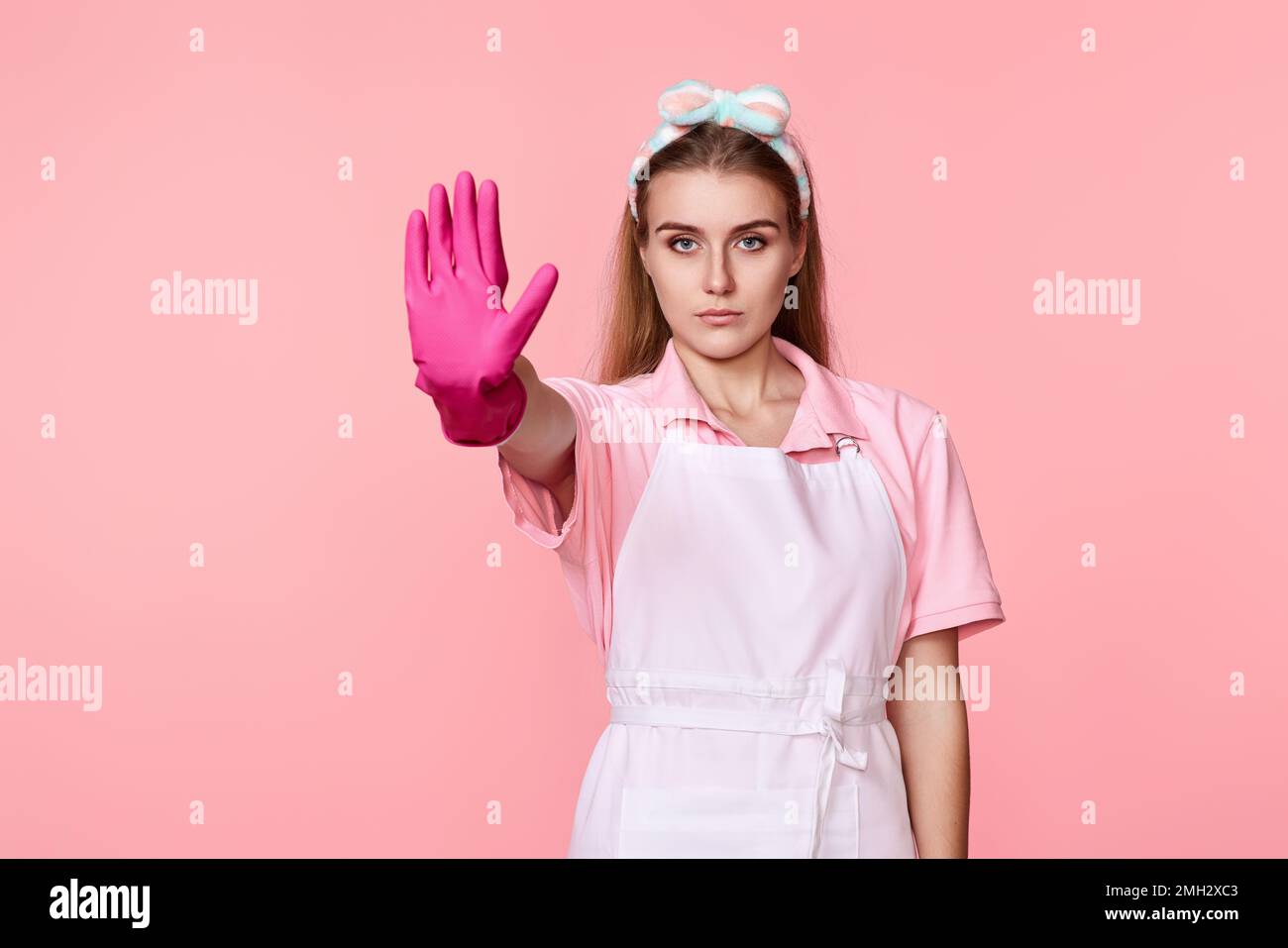 pretty woman in gloves and cleaner apron Stock Photo - Alamy