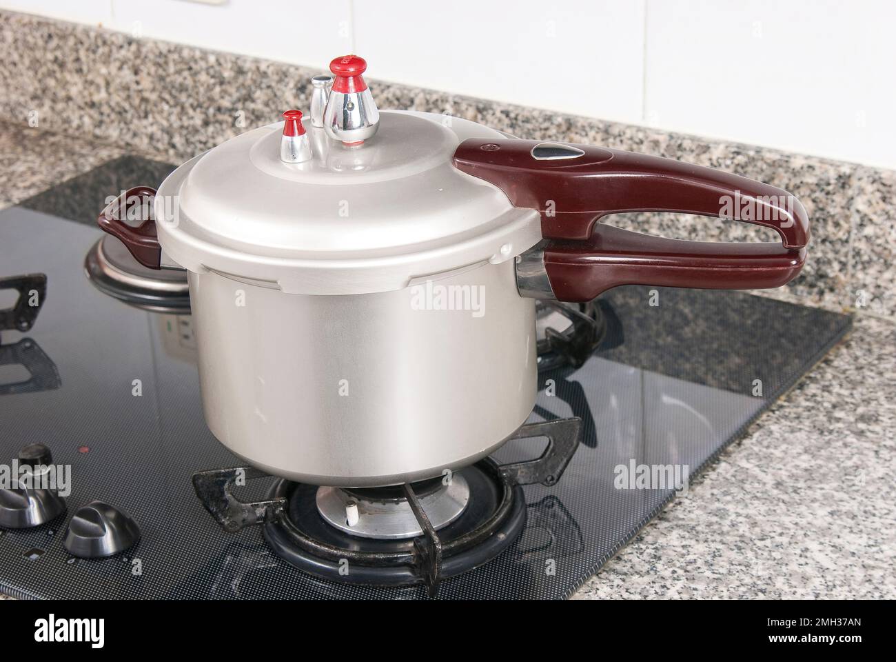 Pressure cooker; photo about stove in the kitchen. Stock Photo