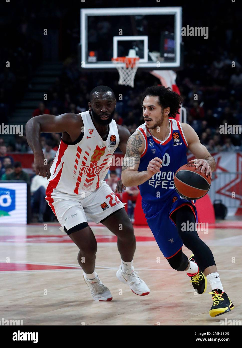 Anadolu Efes' Shane Larkin, right, drives to the basket as Red Star's  Charles Jenkins blocks him during their Euroleague basketball match in  Belgrade, Serbia, Friday, Jan. 31, 2020. (AP Photo/Darko Vojinovic Stock