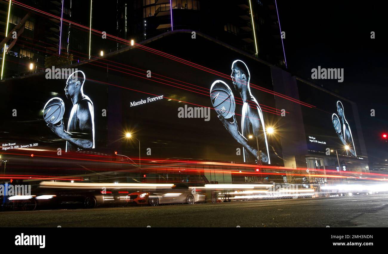 A mural of the late Kobe Bryan on a building is seen near Staples Center, Tuesday, Jan. 28, 2020, in Los Angeles. Bryant, the 18-time NBA All-Star who won five championships and became one of the greatest basketball players of his generation during a 20-year career with the Los Angeles Lakers, died in a helicopter crash Sunday. (AP Photo/Ringo H.W. Chiu) Stock Photo