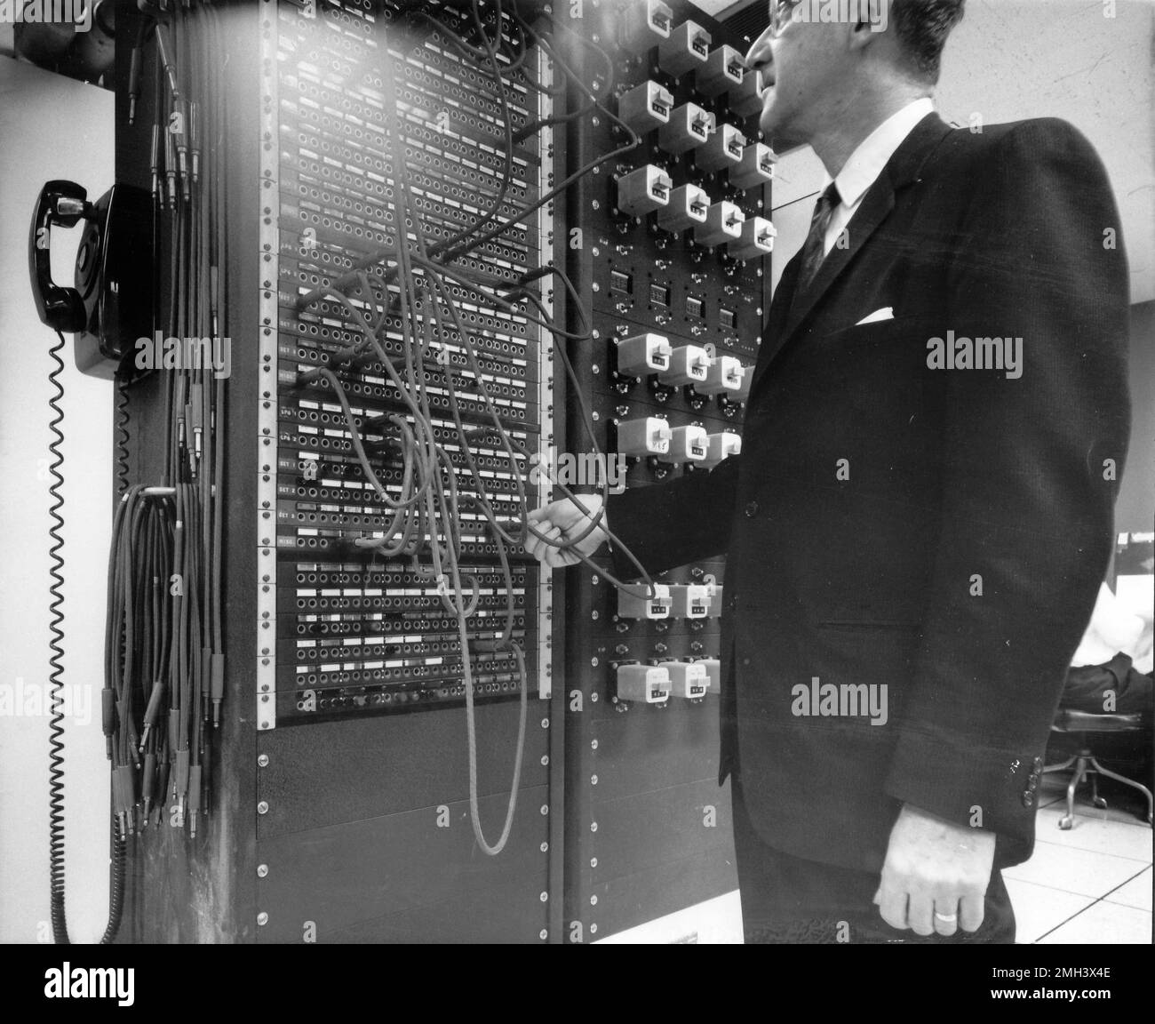 AP Staffer demonstrates circuit system inside the computer room at AP ...