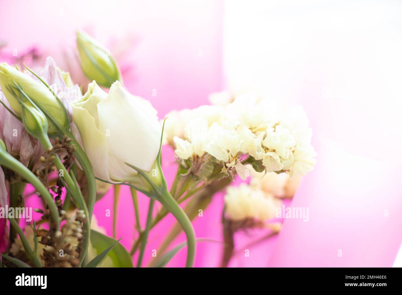 holiday bouquet with different flowers in sunlight closeup, bouquet of