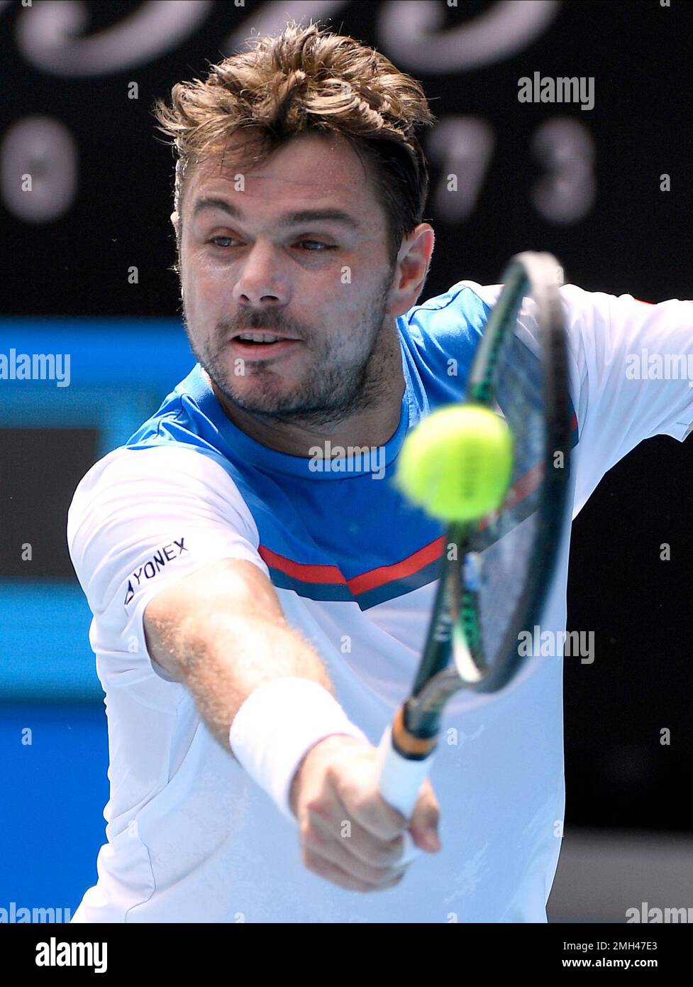 Switzerland's Stan Wawrinka makes a backhand return to Russia's Daniil  Medvedev during their fourth round singles match at the Australian Open  tennis championship in Melbourne, Australia, Monday, Jan. 27, 2020. (AP  Photo/Andy