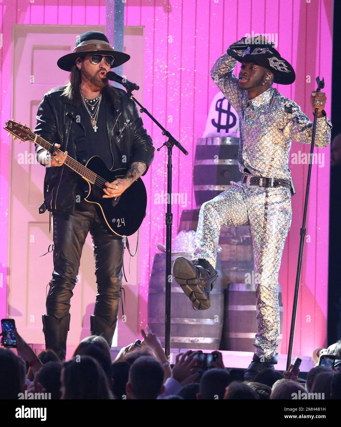Billy Ray Cyrus, left, and Lil Nas X perform 