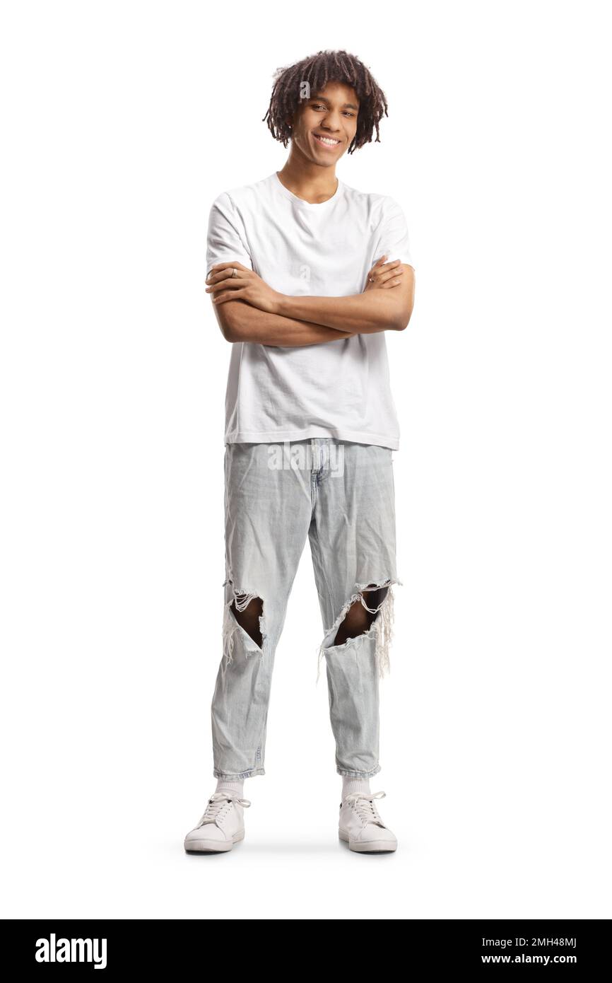 Full length portrait of a young afro american man with dreadlocks standing and smiling isolated on white background Stock Photo