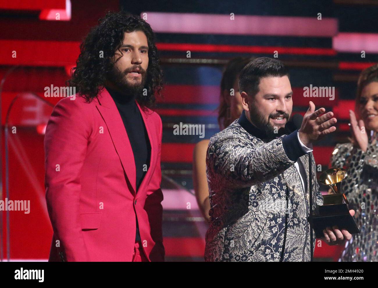 Dan Smyers, left, and Shay Mooney, of Dan + Shay, accept the award for ...