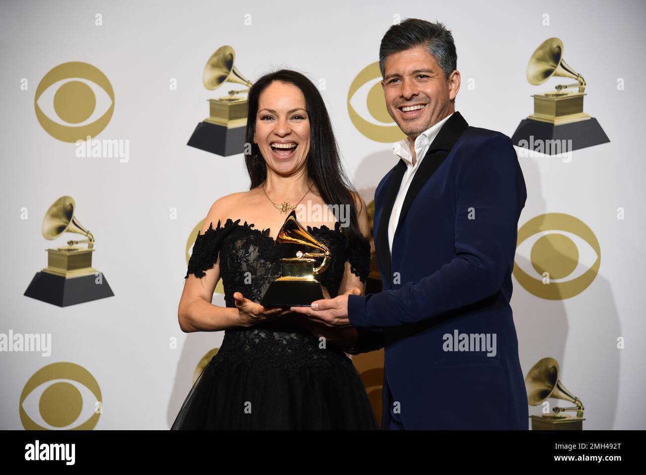 Gabriela Quintero, left, and Rodrigo Sanchez of Rodrigo y Gabriela pose