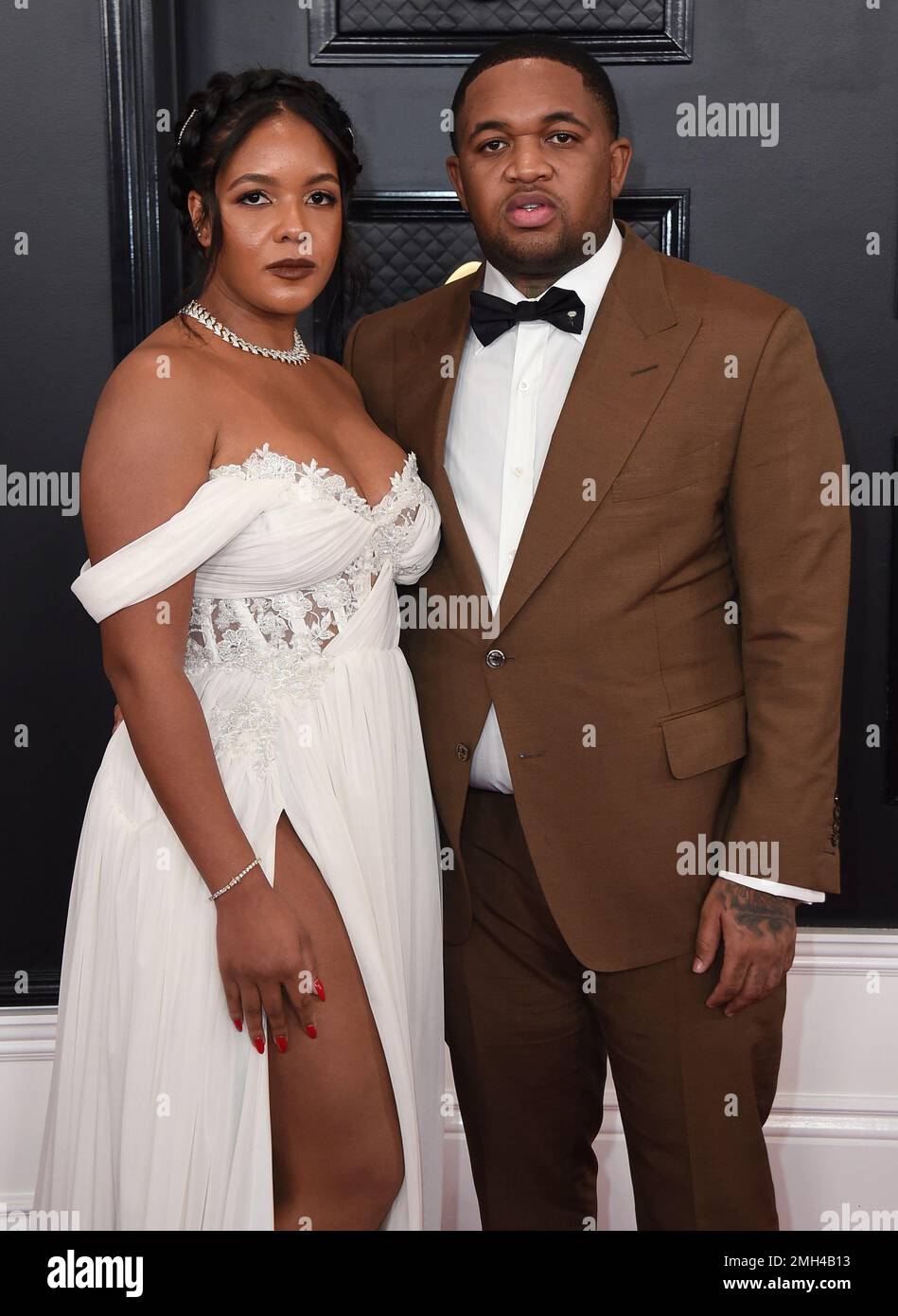 Chanel Dijon, left, and DJ Mustard arrive at the 62nd annual Grammy Awards  at the Staples Center on Sunday, Jan. 26, 2020, in Los Angeles. (Photo by  Jordan Strauss/Invision/AP Stock Photo -