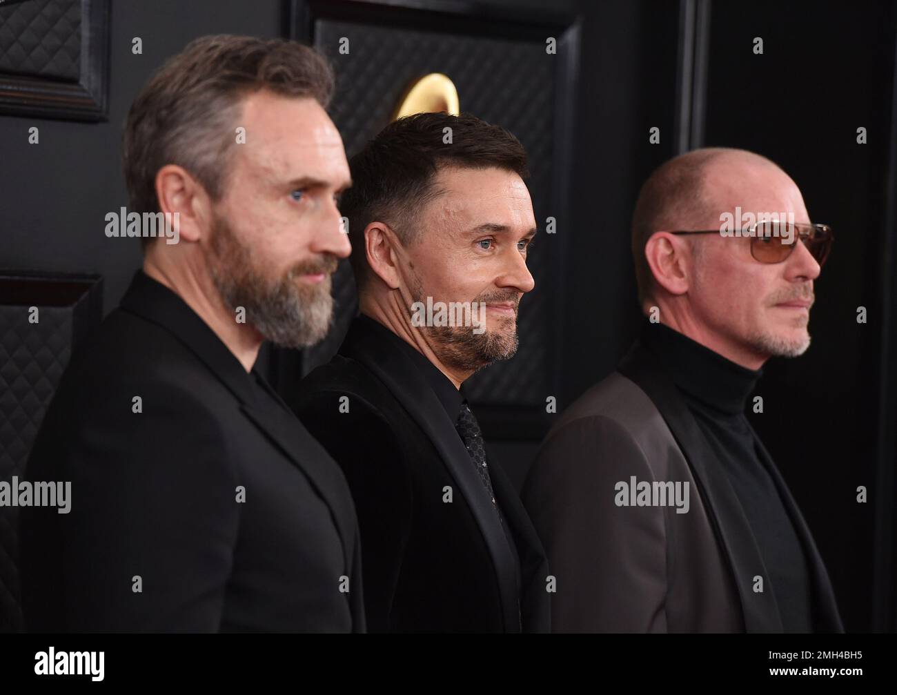 Noel Hogan, from left, Michael Gerard Hogan and Fergal Lawler, of The