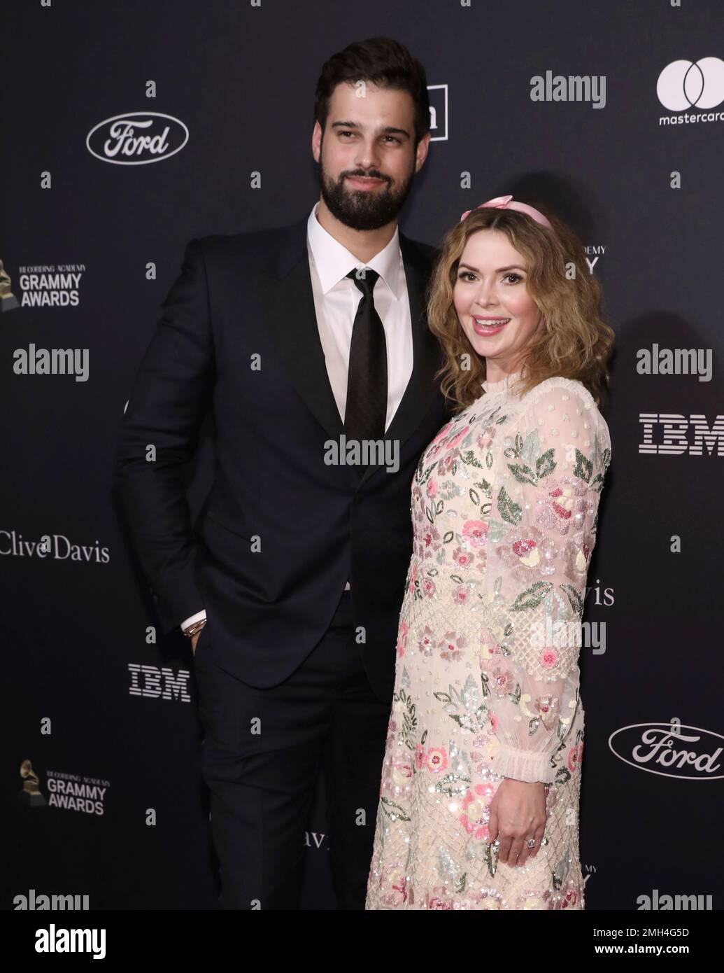 Jacob Andreou, left, and Carly Steel arrive at the Pre-Grammy Gala And ...
