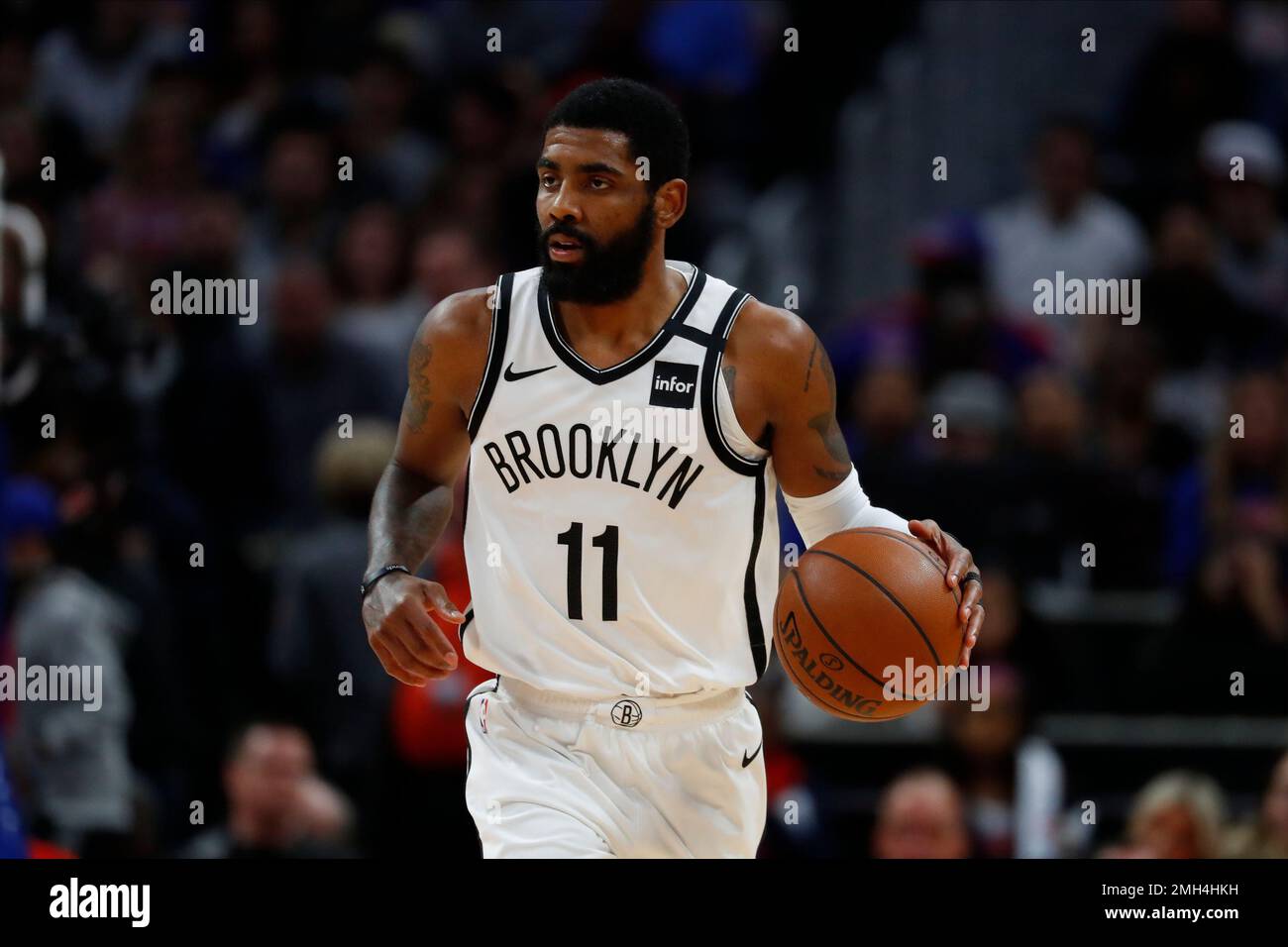 Brooklyn Nets guard Kyrie Irving plays against the Detroit Pistons in