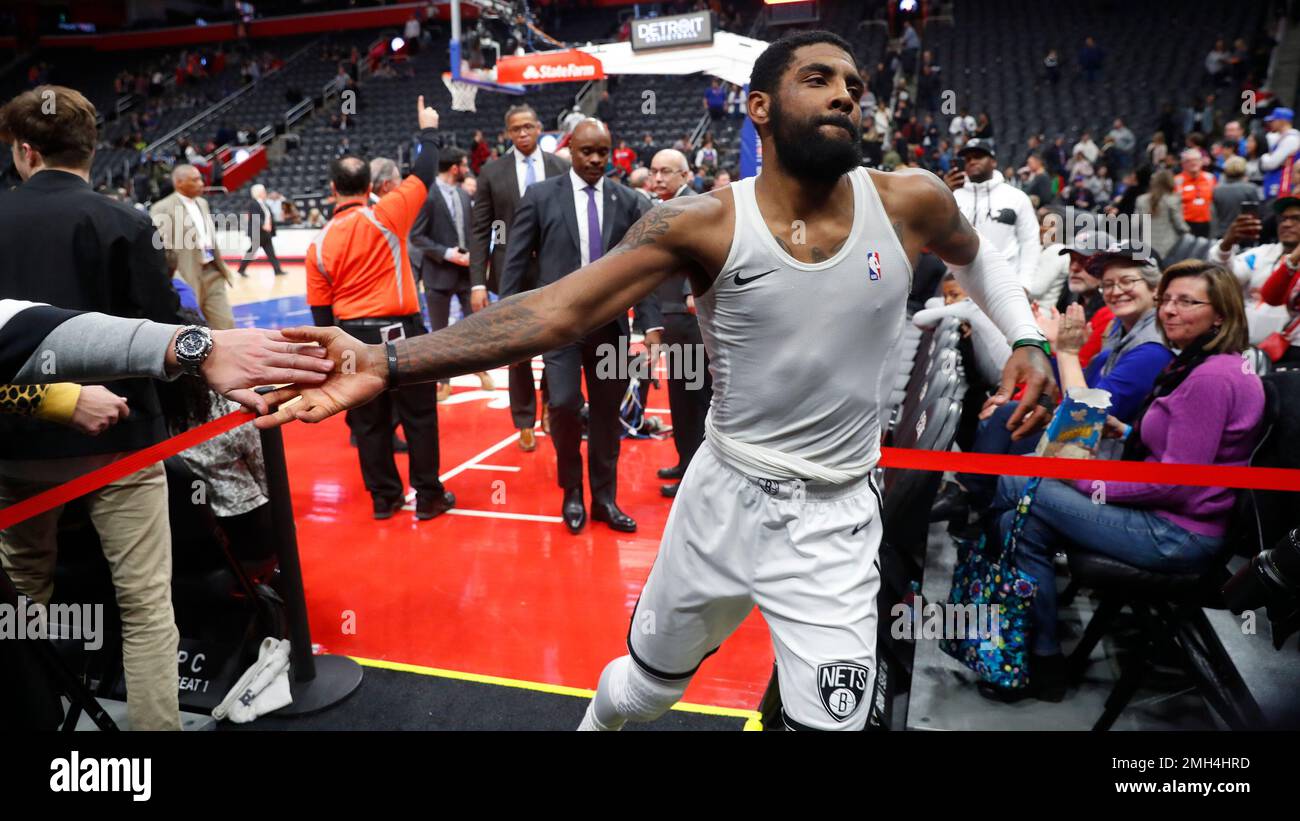 Brooklyn Nets guard Kyrie Irving leaves the court after an NBA