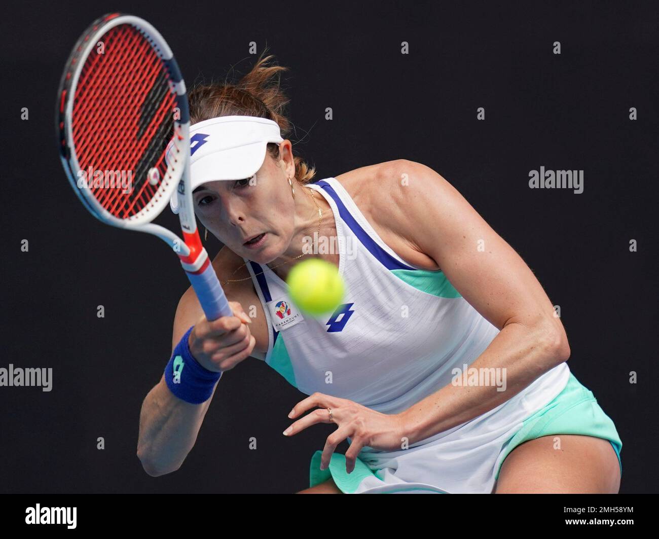 France's Alize makes a forehand return to Croatia's Donna Vekic