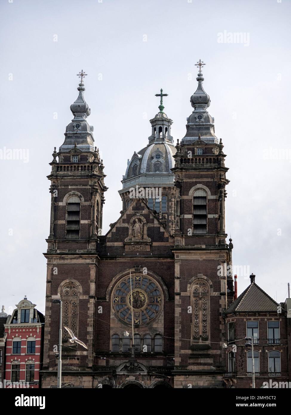 AMSTERDAM, NETHERLANDS - MAY 01, 2018:  Exterior view of  Basilica of St. Nicholas (Sint-Nicolaasbasiliek) on Prins Hendrikkade Stock Photo
