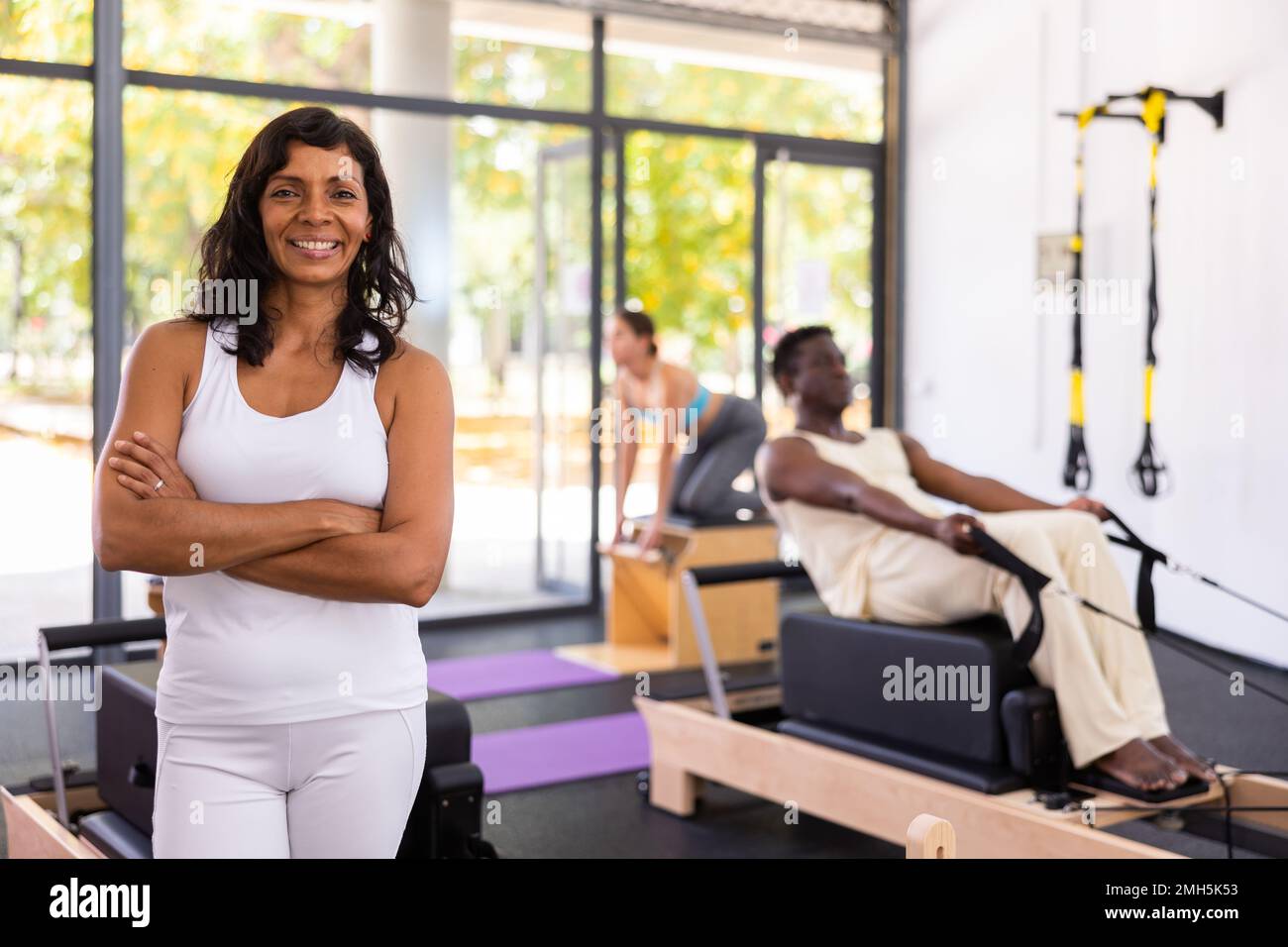 Portrait of girl in sportswear posing in pilates studio. Healthy lifestyle and fitness concept Stock Photo Alamy