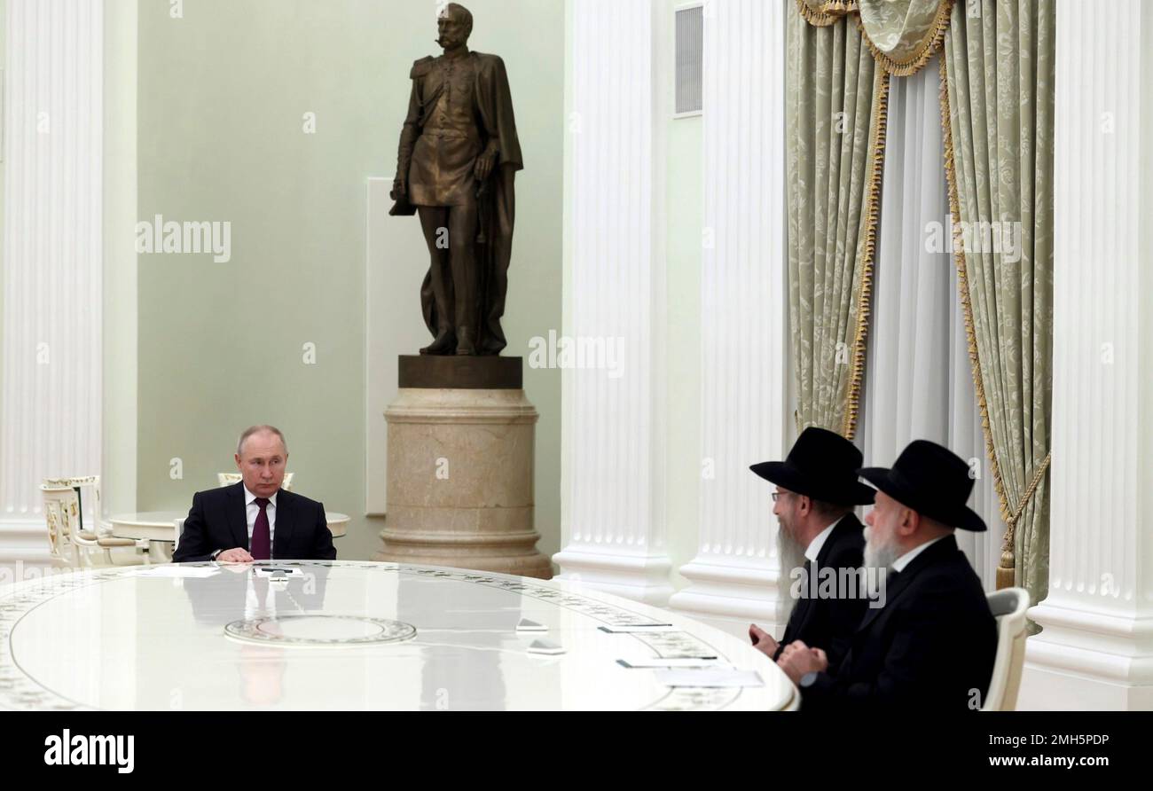 Moscow, Russia. 26th Jan, 2023. Russian President Vladimir Putin holds a face-to-face meeting with the Chief Rabbi of Russia Berl Lazar, center, and President of the Federation of Jewish Communities Alexander Boroda, right, to discuss the upcoming International Holocaust Remembrance Day at the Kremlin, January 26, 2023 in Moscow, Russia. Credit: Mikhail Metzel/Kremlin Pool/Alamy Live News Stock Photo