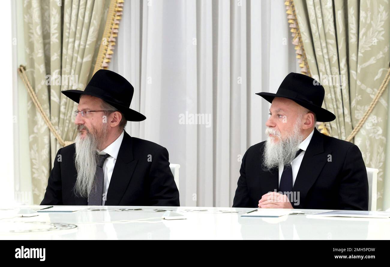 Moscow, Russia. 26th Jan, 2023. The Chief Rabbi of Russia Berl Lazar, left, and President of the Federation of Jewish Communities Alexander Boroda, right, listen to Russian President Vladimir Putin during a face-to-face meeting at the Kremlin, January 26, 2023 in Moscow, Russia. Credit: Mikhail Metzel/Kremlin Pool/Alamy Live News Stock Photo
