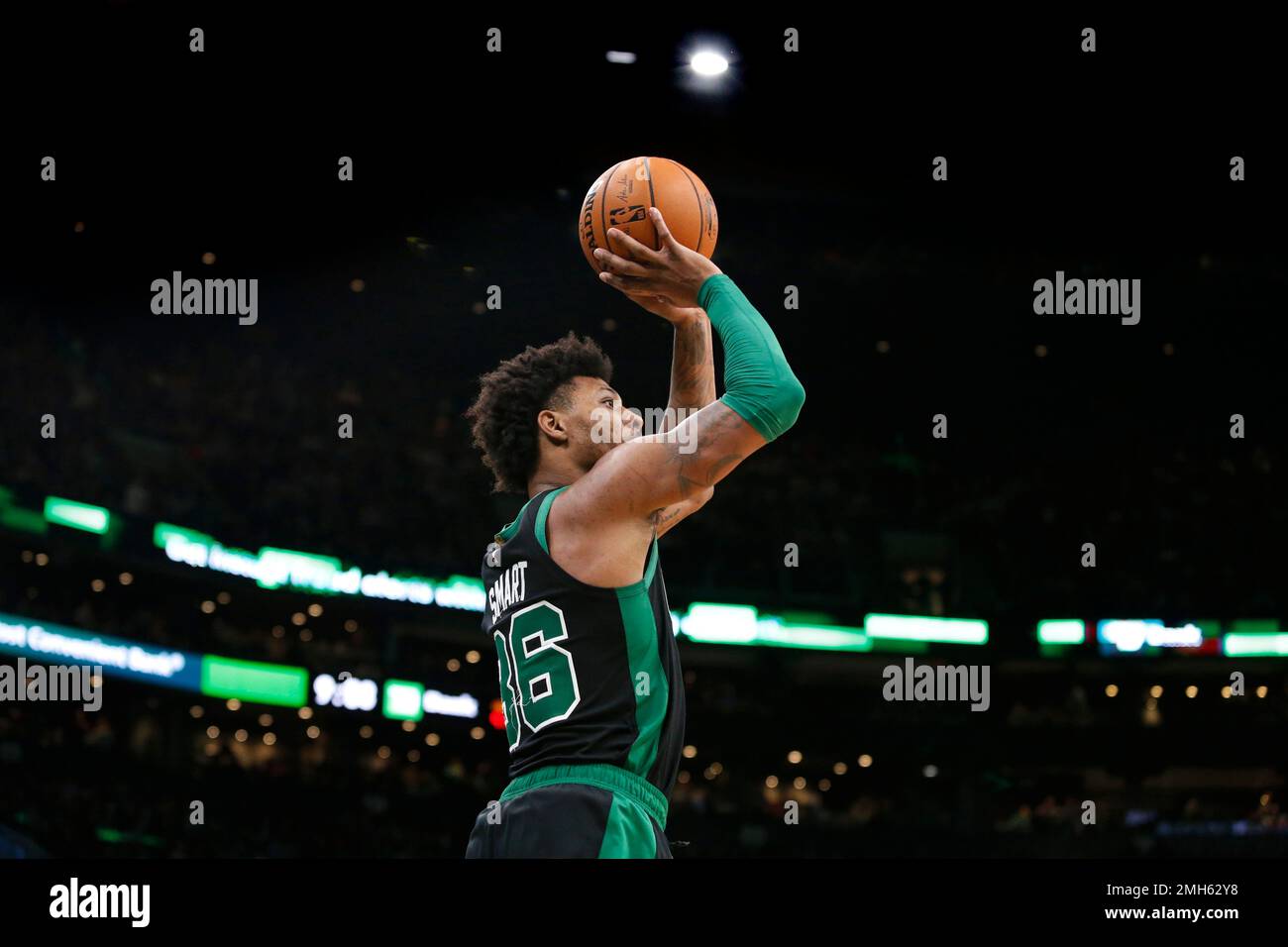 Boston Celtics guard Marcus Smart (36) shoots a threepoint shot during