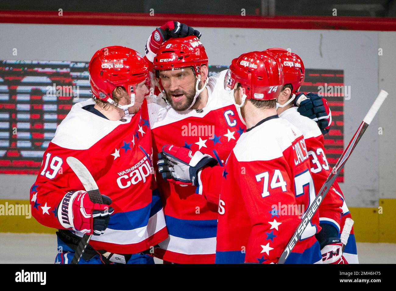 Washington Capitals left wing Alex Ovechkin 8 from Russia is congratulated by center Nicklas Backstrom 19 from Sweden defenseman John Carlson 74 and defenseman Radko Gudas 33 from Czech Republic after...