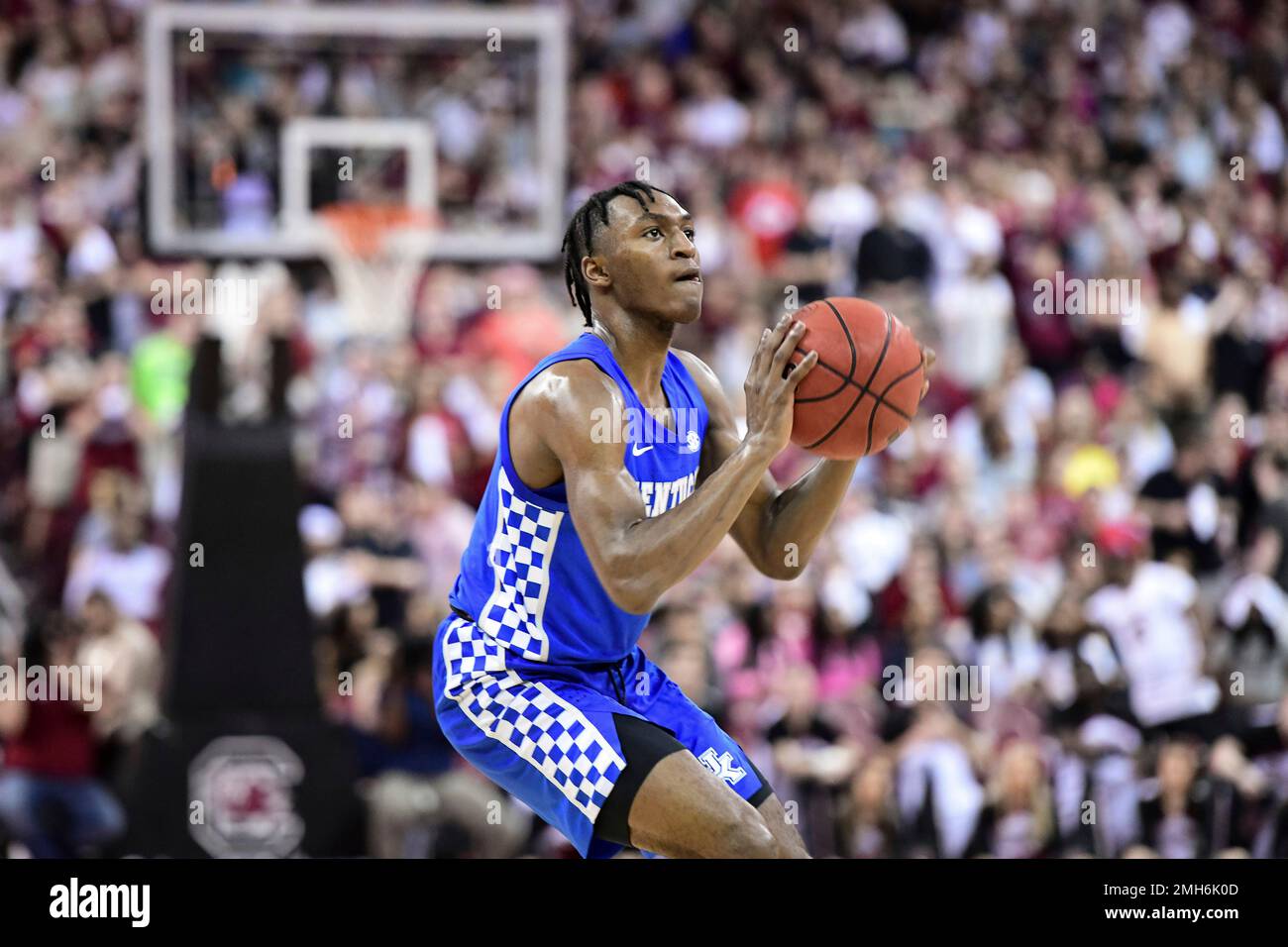 Kentucky guard Immanuel Quickley (5) attempts a shot against South