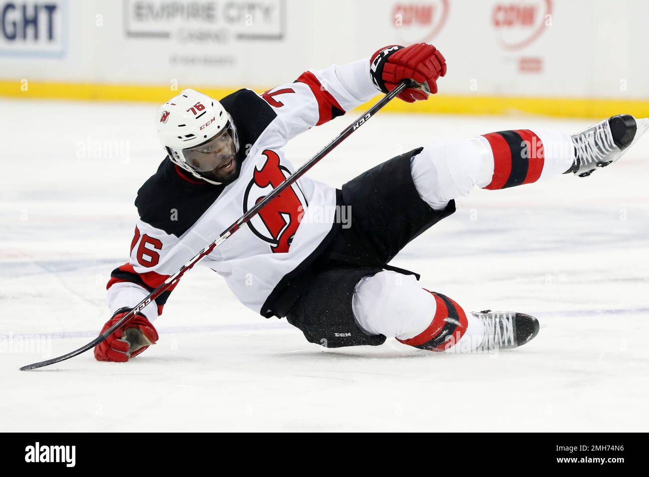 New Jersey Devils defenseman P.K. Subban (76) stretches before an NHL hockey  game against the Vancouver Canucks Monday, Feb. 28, 2022, in Newark, N.J.  The Devils wore warmup jerseys designed by Subban