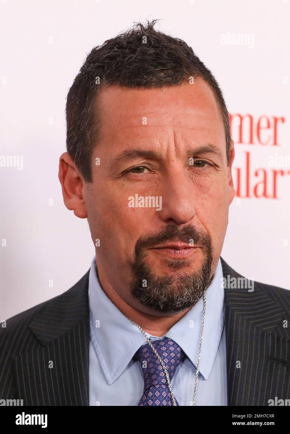 Jackie Sandler and Adam Sandler attend the AARP 19th Annual Movies For Grownups Awards at the Beverly Wilshire Hotel on Saturday, Jan 11, 2020, in Beverly Hills, Calif. (Photo by Mark Von Holden/Invision/AP) Stock Photo