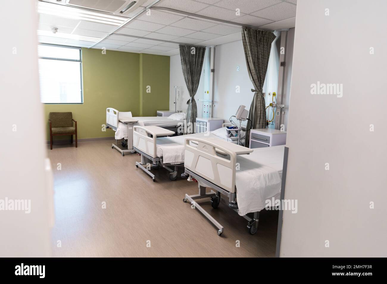 General view of room with beds and medical equipment at hospital Stock Photo