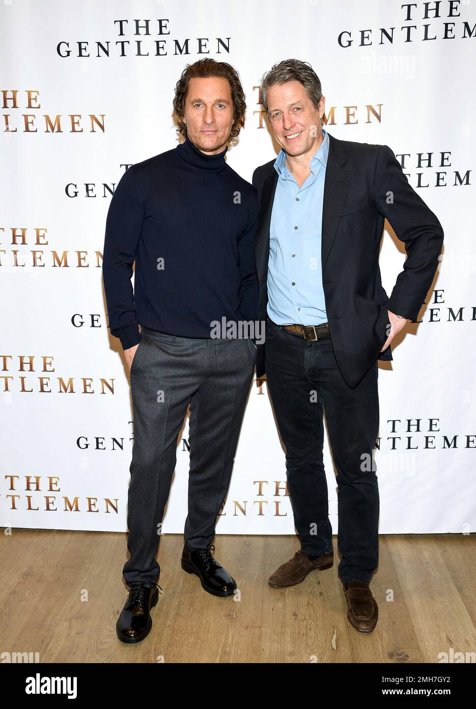 Actors Matthew McConaughey, left, and Hugh Grant pose together during