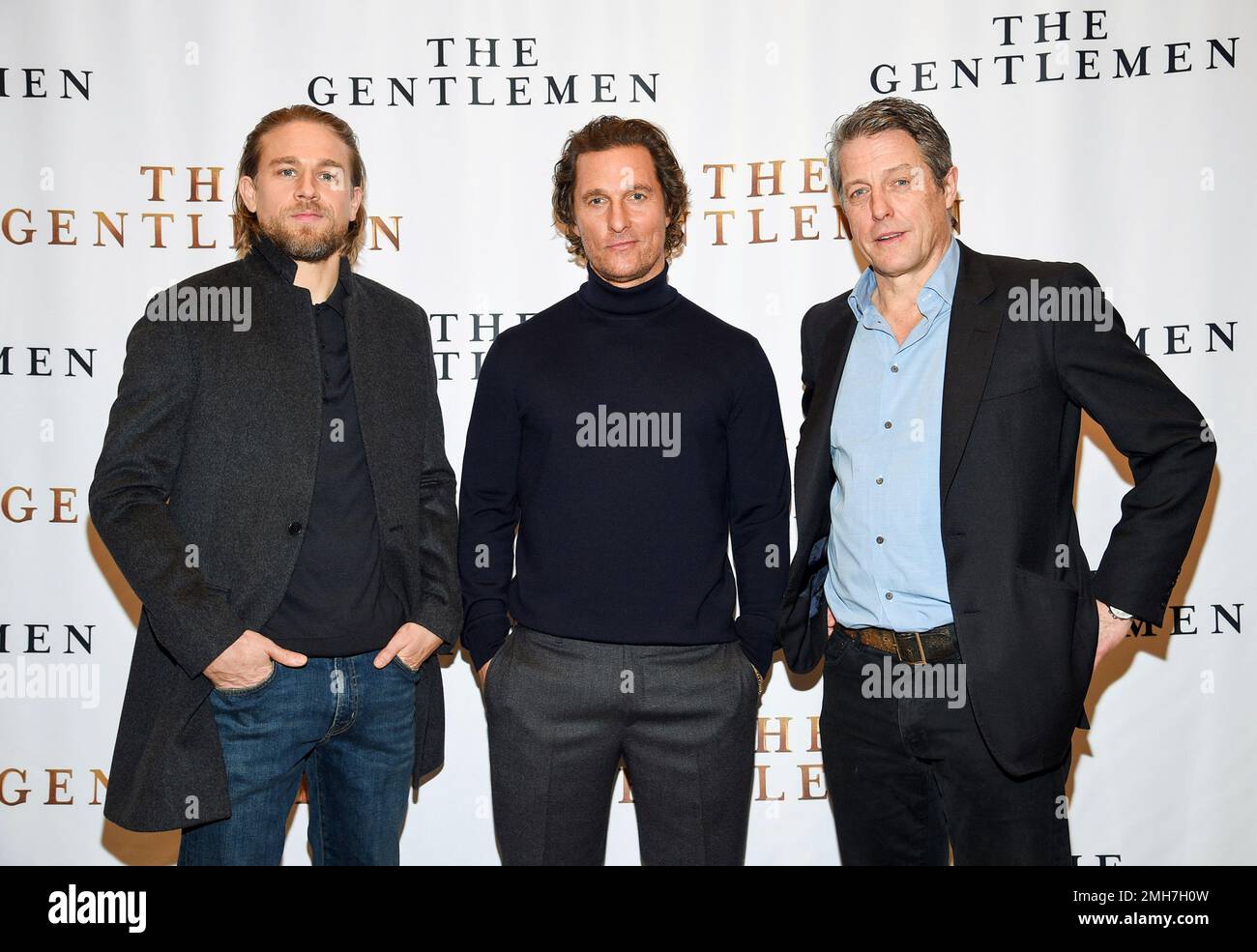 Actors Charlie Hunnam, left, Matthew McConaughey and Hugh Grant pose