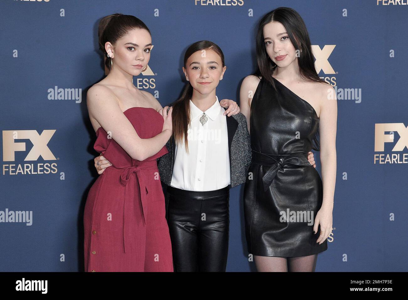 Hannah Alligood, from left, Olivia Edward and Mikey Madison pose at the