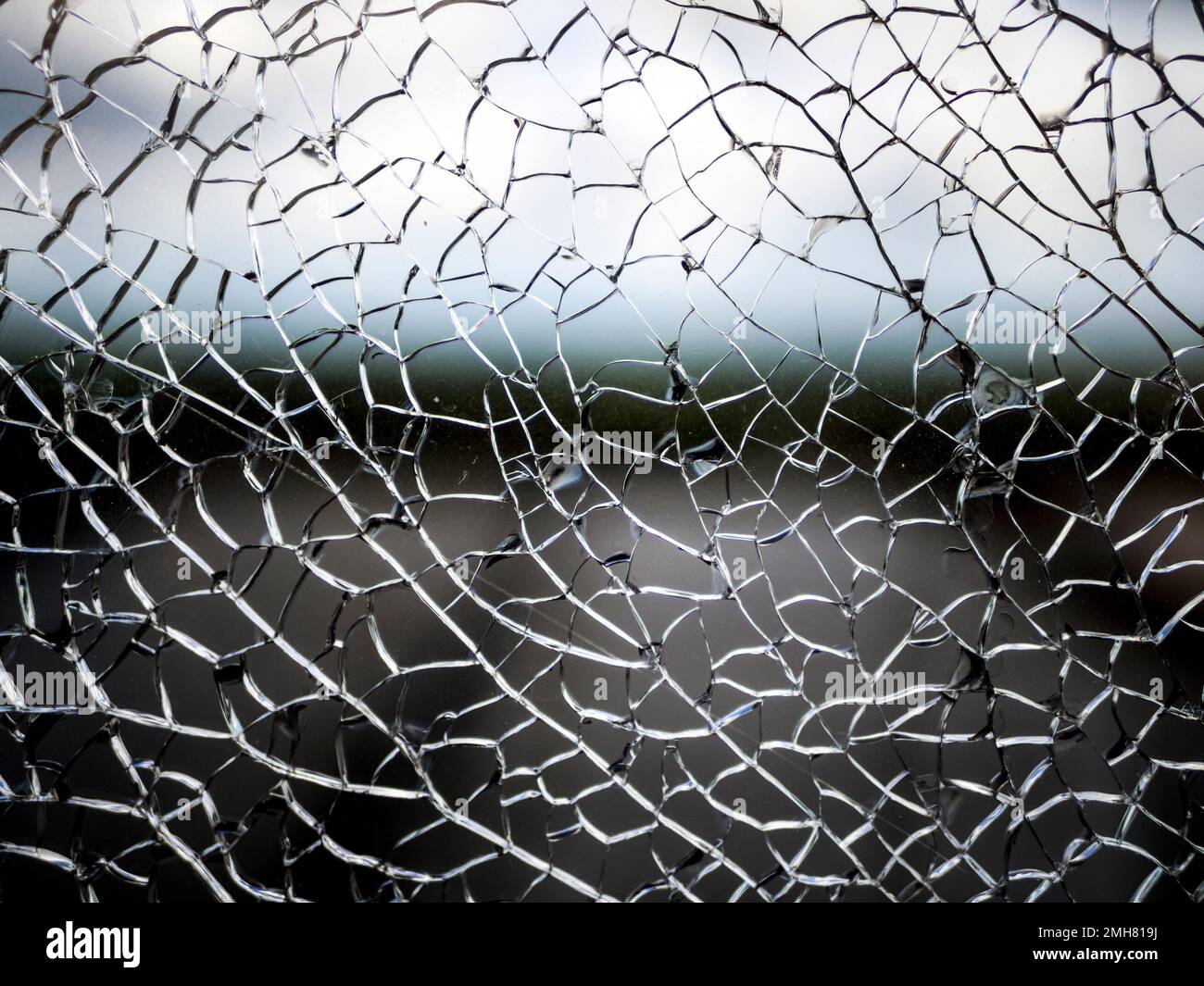 https://c8.alamy.com/comp/2MH819J/useful-texture-overlay-a-broken-glass-on-with-many-sharp-shards-useful-texture-overlay-for-background-2MH819J.jpg