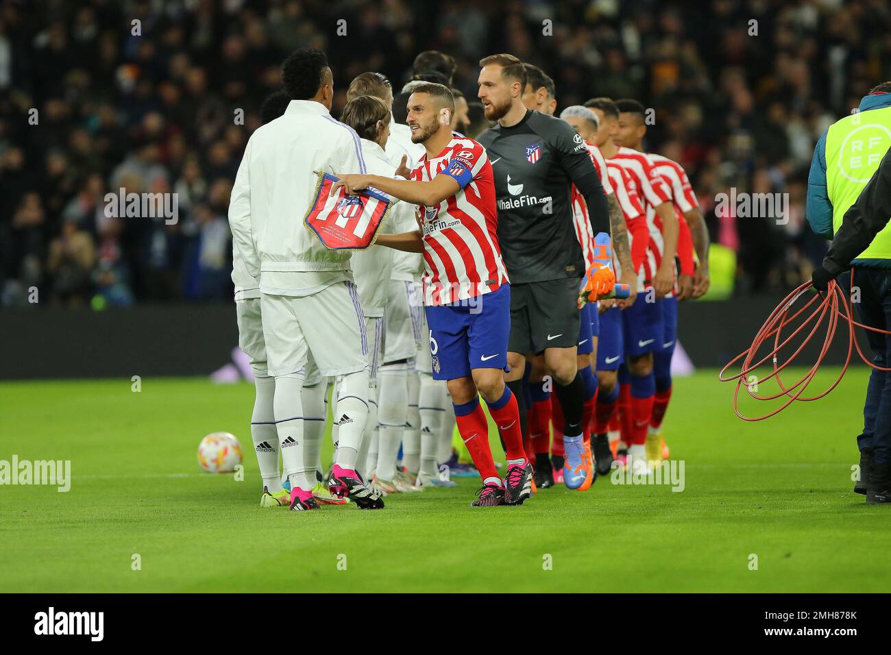 Madrid, Spain. 28th Oct, 2022. Teams shake hands prior to start of match Copa del Rey Match Day 6 between Real Madrid C.F. and Atletico de Madrid at Santiago Bernabeu Stadium in Madrid, Spain, on January 27, 2023 (Photo by Edward F. Peters/Sipa USA) Credit: Sipa USA/Alamy Live News Stock Photo