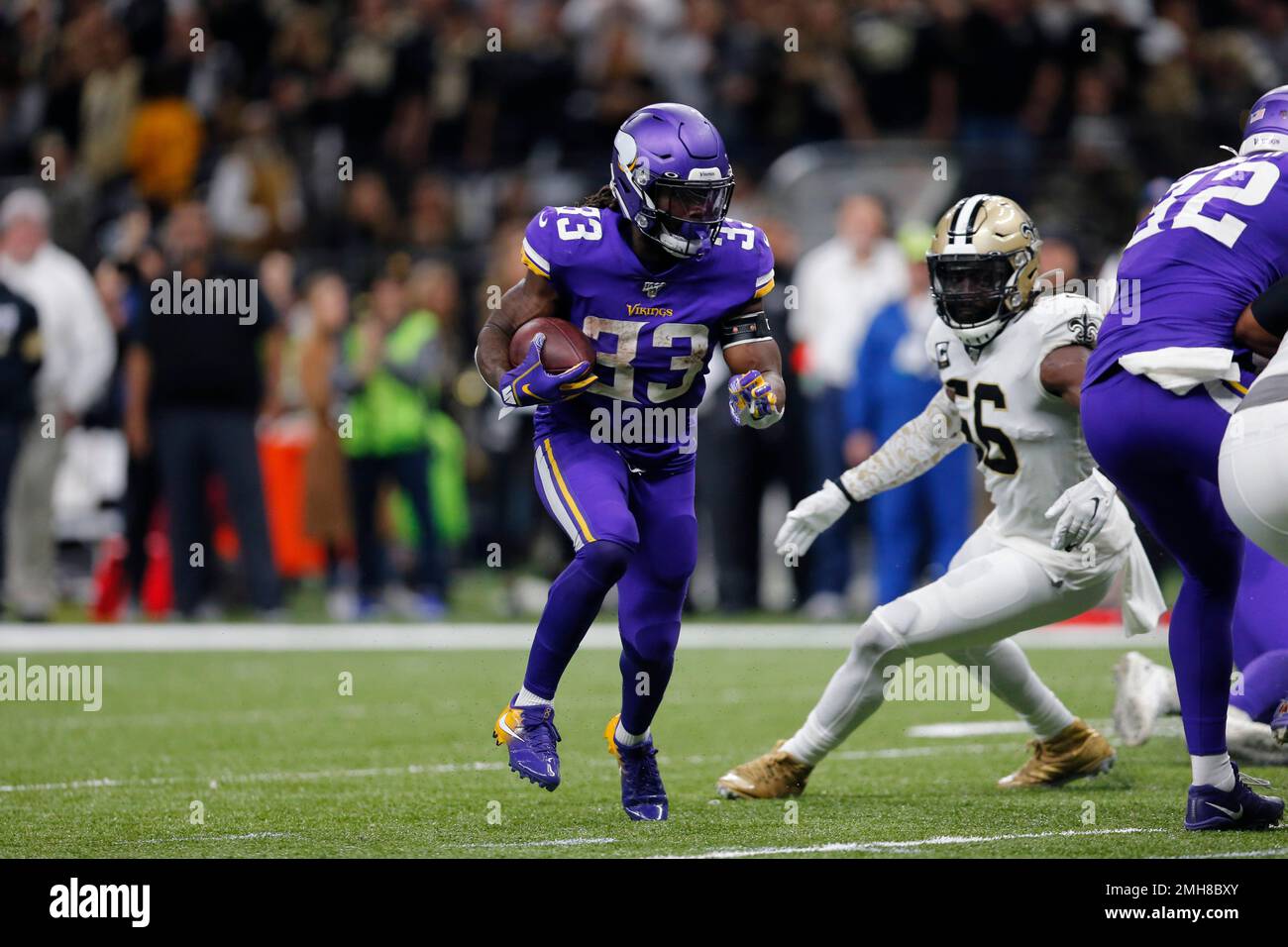 San Francisco 49ers defensive tackle DeForest Buckner (99) and Nick Bosa  (97) prepare to tackle Minnesota Vikings running back Dalvin Cook (33)  during an NFL divisional playoff game, Saturday, Jan. 11, 2020