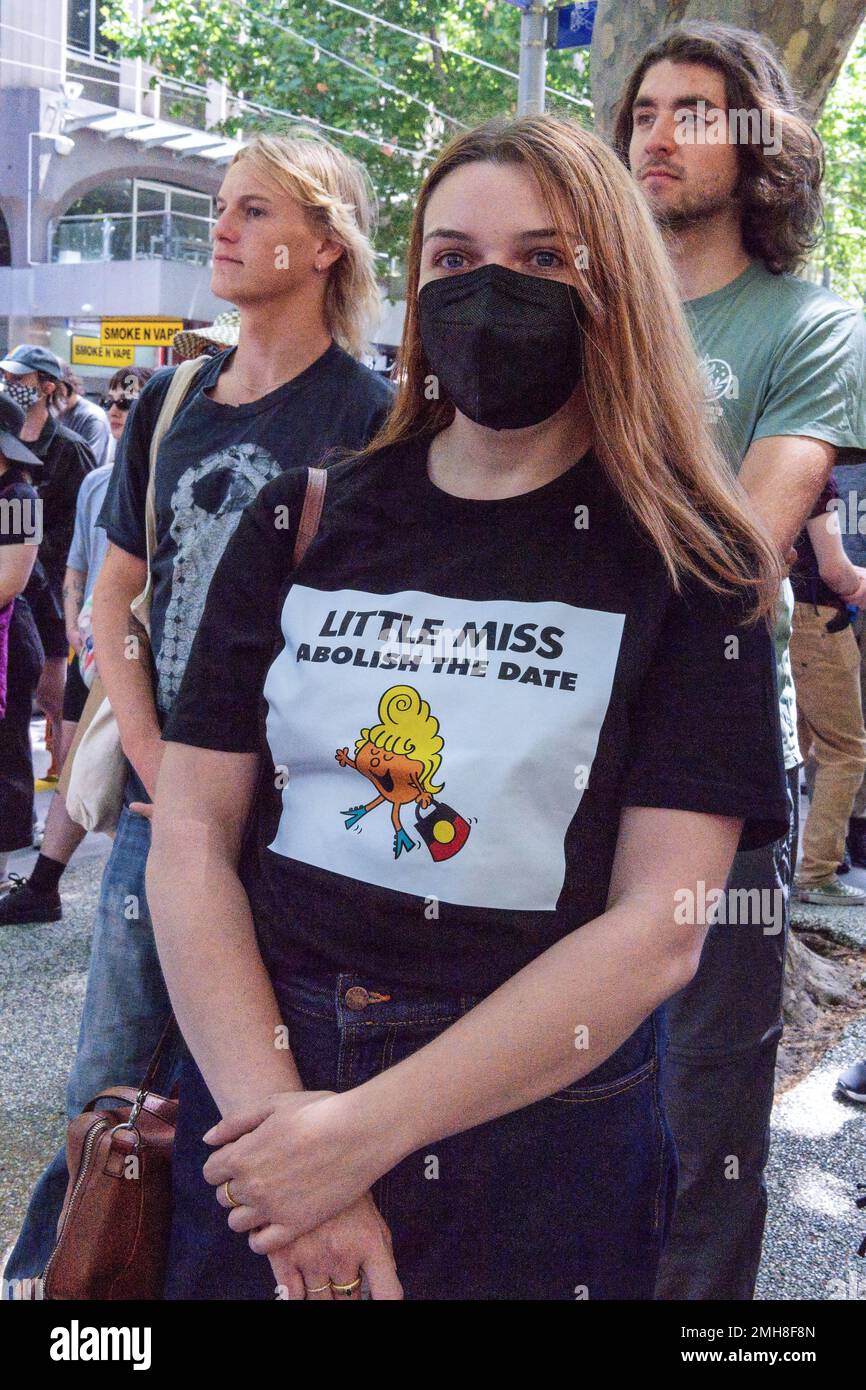 Melbourne, Australia, 26 January, 2023. A protester wearing a 'little miss change the date' T-shirt during the annual Invasion Day protest in Melbourne, organized by Indigenous Australians and their allies, calls for an end to the celebration of Australia Day and for the recognition of Indigenous sovereignty. Credit: Michael Currie/Speed Media/Alamy Live News Stock Photo