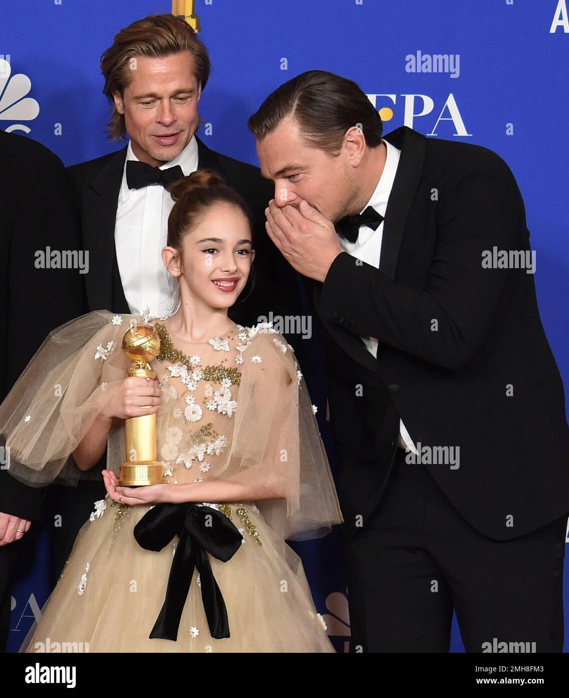 Brad Pitt, from left, Julia Butters and Leonardo DiCaprio, from the