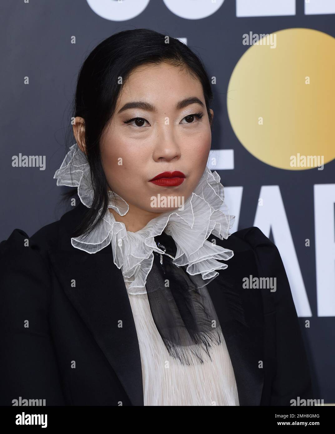 Awkwafina arrives at the 77th annual Golden Globe Awards at the Beverly ...