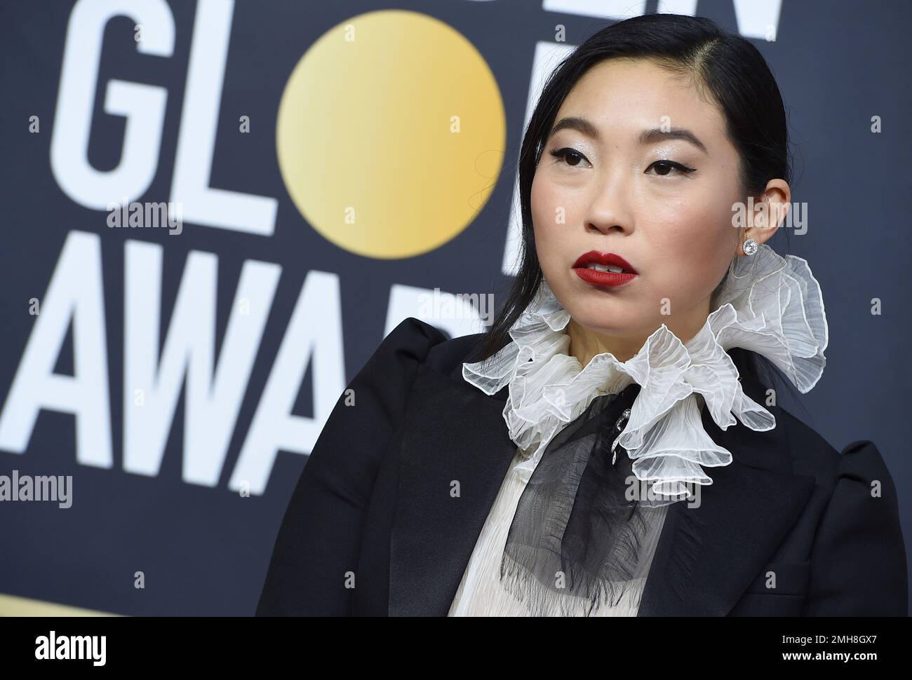 Awkwafina arrives at the 77th annual Golden Globe Awards at the Beverly ...